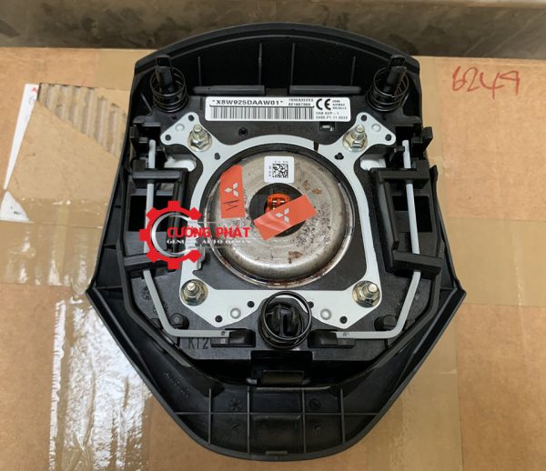 Mặt sau túi khí vô lăng Attrage, Mirage, New Triton chính hãng